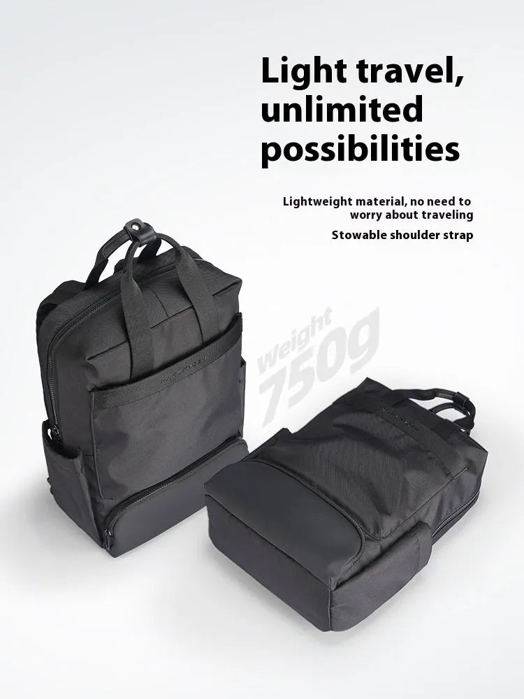 Elegant black Oxford cloth computer backpack with a 20-35 litre capacity.