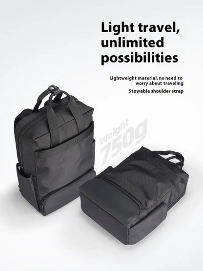 Elegant black Oxford cloth computer backpack with a 20-35 litre capacity.