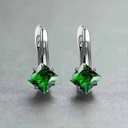 Diamond design earrings with inlaid zircon stones in copper, showing light luxury style for women in blue, green, and colour options.