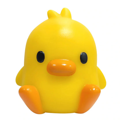 Small yellow duck-shaped night lamp measuring 6cm tall with warm LED light