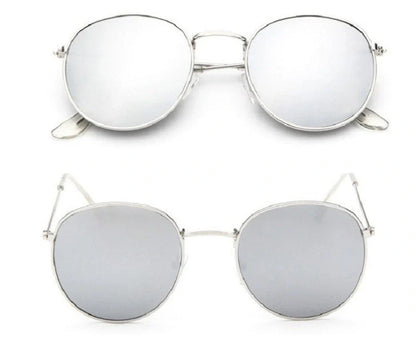 Stylish women's retro sunglasses with round frame and metal finish