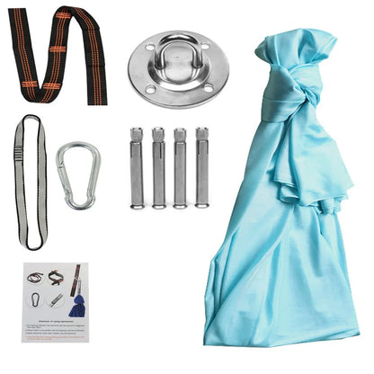 Child in black therapy swing cocoon with multi-loop daisy chain height adjustment system