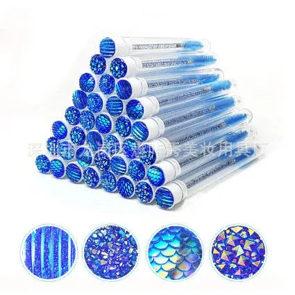 Disposable eyelash brushes in plastic storage tubes with spiral brush heads in four colours