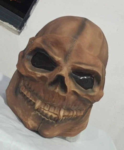 Detailed bronze skull Halloween mask with movable jaw, perfect for spooky Halloween parties and decor