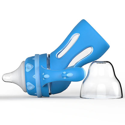 Glass baby bottle with temperature-sensitive silicone sleeve and USB milk warmer for safe, natural feeding