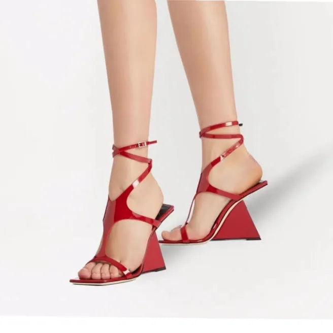 Women's black high heel sandals with a square toe and ankle buckle on a 9.5cm heel.
