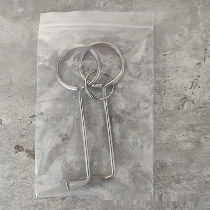 Two silver alloy wrench tools from a portable universal family set on a plain background.