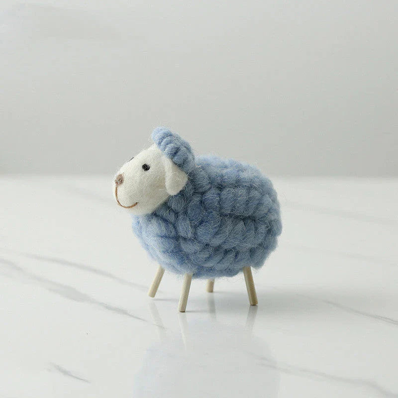 Adorable plush sheep decorations in various sizes and color combinations, perfect for adding a cozy, farmhouse-inspired touch to any home.