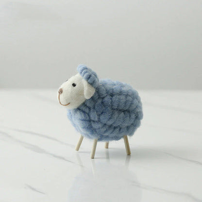Adorable plush sheep decorations in various sizes and color combinations, perfect for adding a cozy, farmhouse-inspired touch to any home.