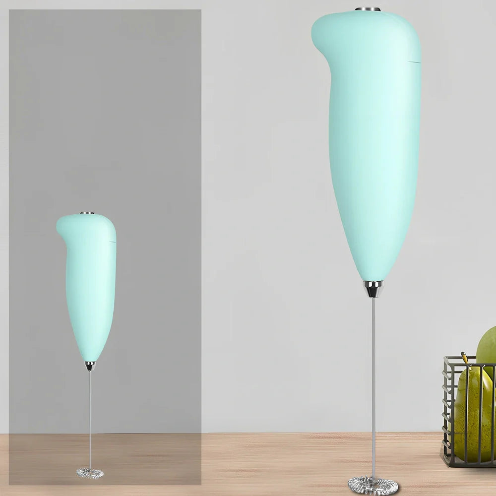 Green electric milk frother measuring 21cm tall with 5cm base creating milk foam