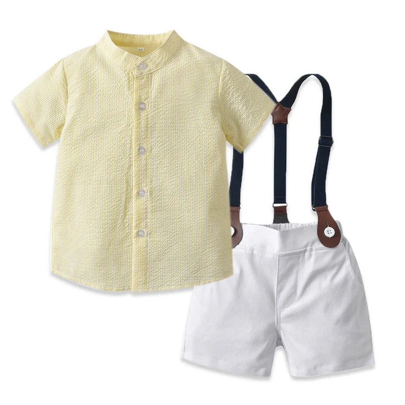 Girl wearing yellow plaid princess cotton dress with matching lace straw hat summer set