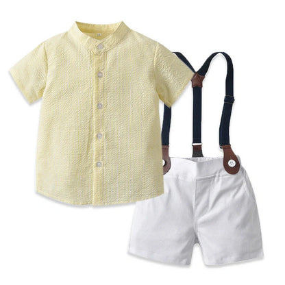 Girl wearing yellow plaid princess cotton dress with matching lace straw hat summer set