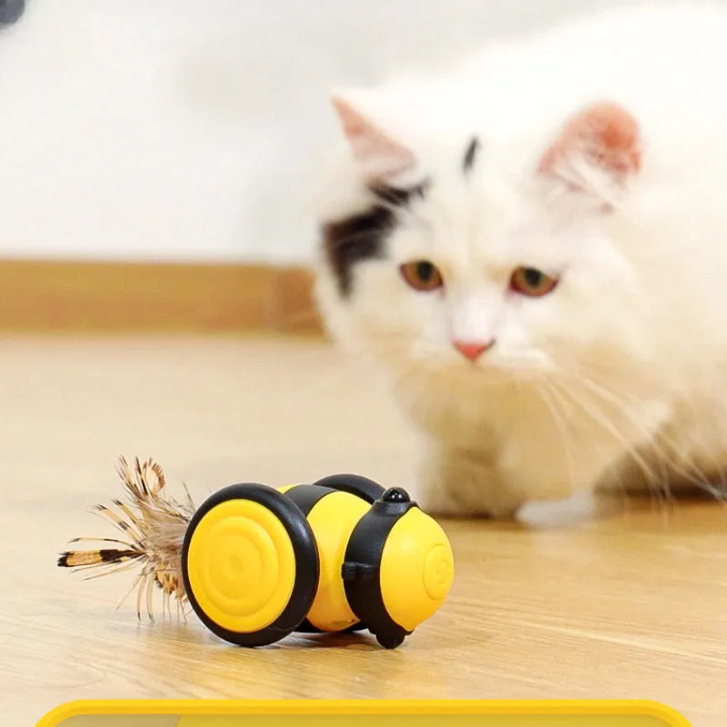 Electric bee-shaped cat car toy with feather teaser moving on floor