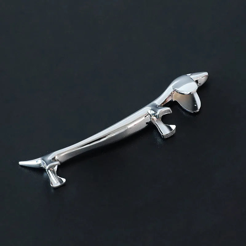 Silver sausage dog chopstick rest and cutlery holder made from zinc alloy with coating for chopsticks, knives or forks