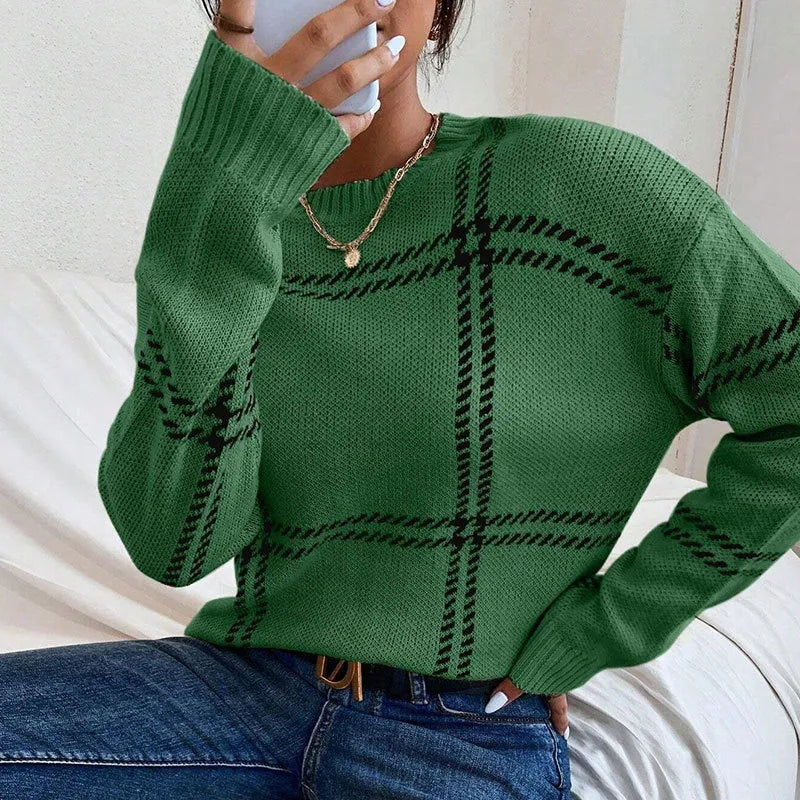 Women's loose-fit plaid colour-block acrylic sweater with apricot, black, beige stripes.