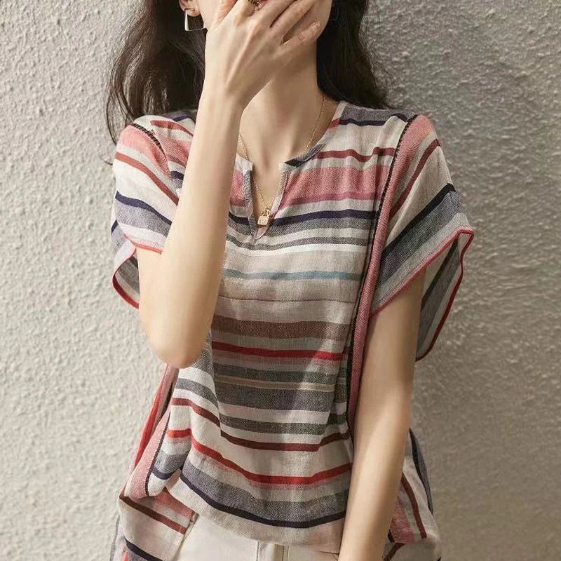 Stylish striped blouse for women with loose, flowy design in variety of sizes