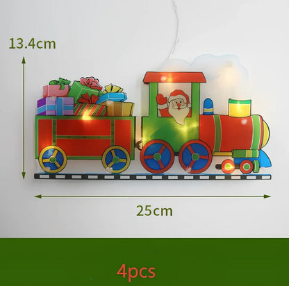 LED Christmas hanging lights with suction cups showing snowman design illuminated on window
