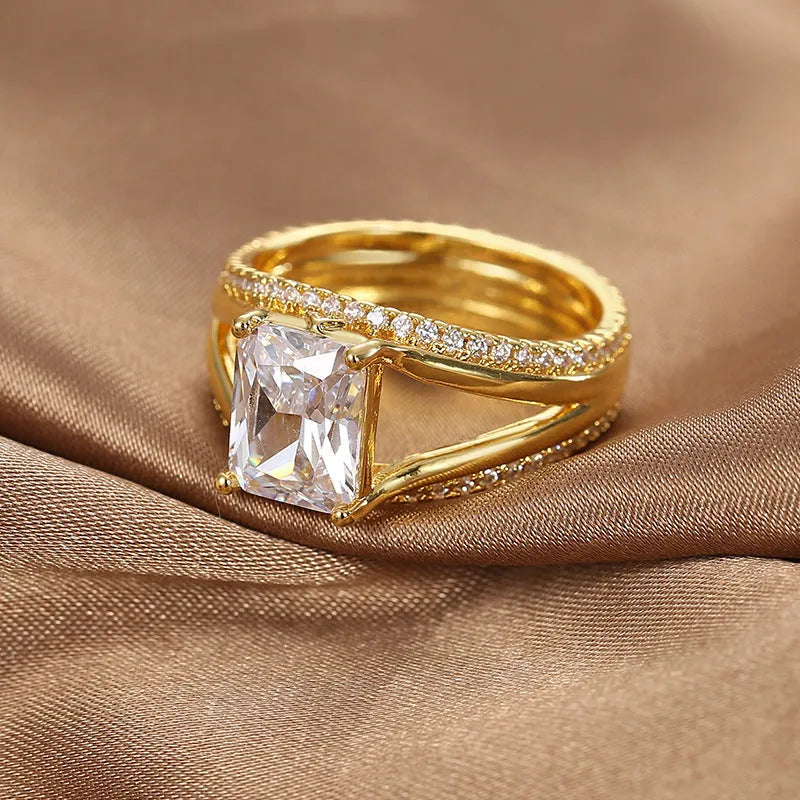 Women's electroplated gold square zircon geometric ring made from copper with sizes available from 6 to 9 for daily wear and special occasions with an all-match design that fits European and American styling sensibilities