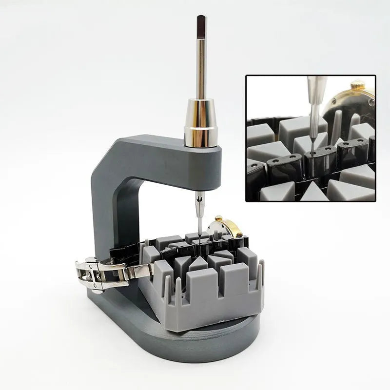 Silver multi-purpose press strap removal tool made from tool steel.