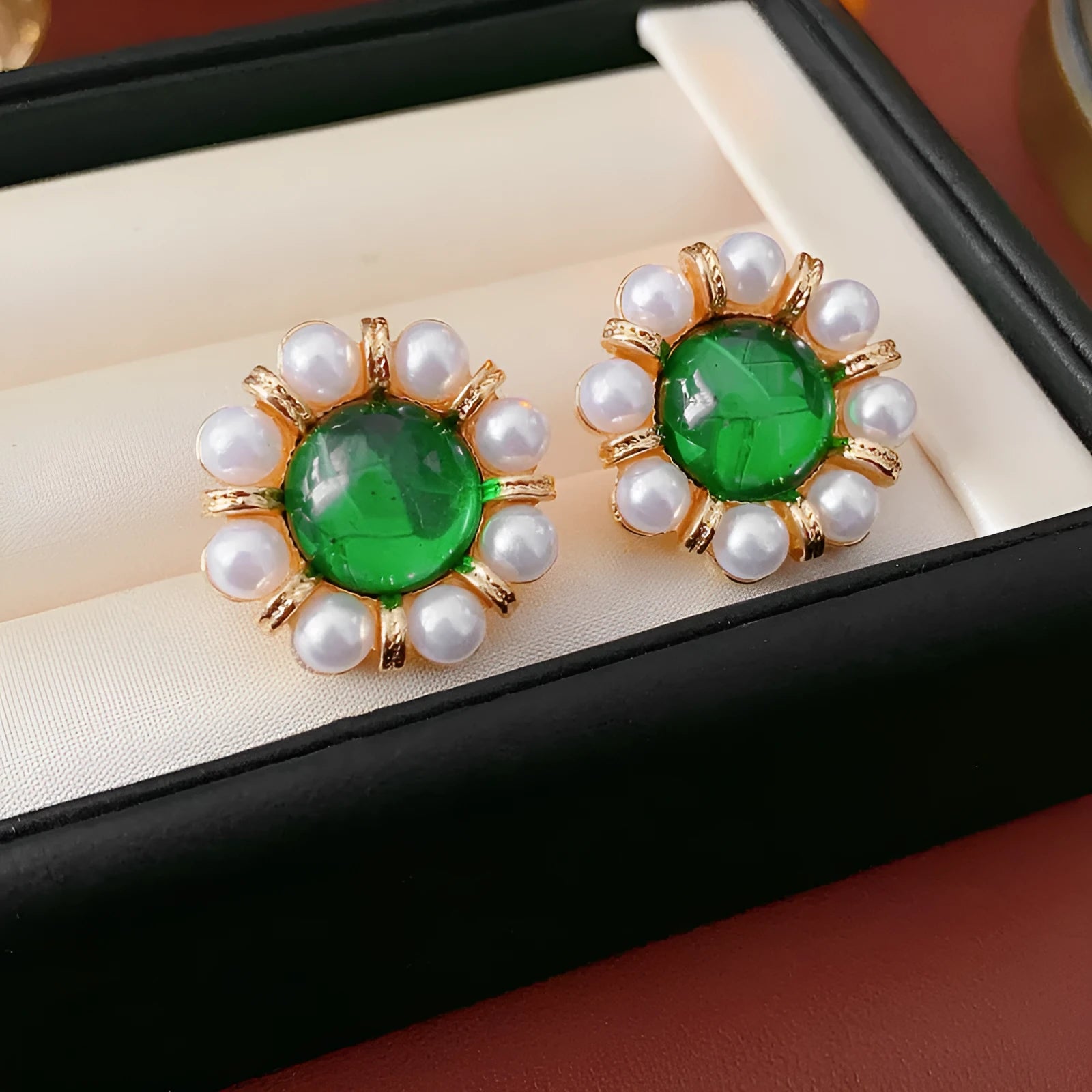 Real gold electroplated pearl stud earrings with geometric round shape and silver needle posts