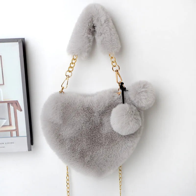 Women's soft plush heart-shaped handbag with shoulder strap in multiple solid colours