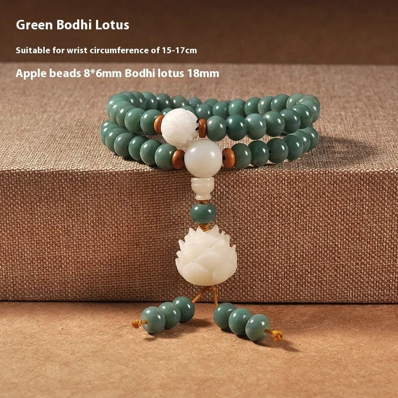 White jade bodhi and green sandalwood bracelet with a double ring safety buckle clasp.