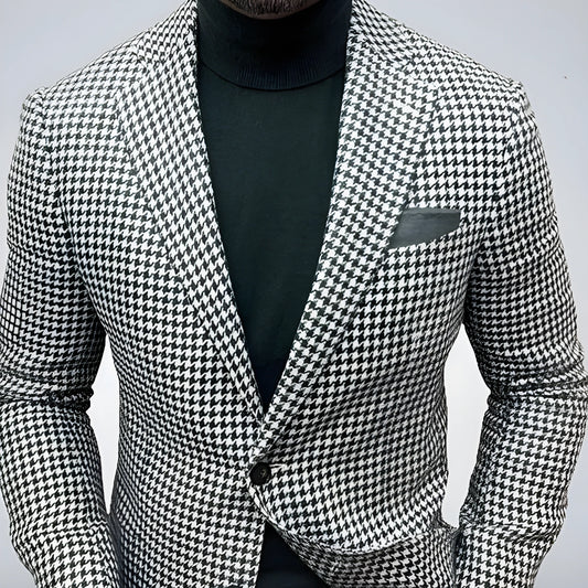 Men's slim fit two-button suit jacket with large top-stitch pockets in a polyester blend fabric.