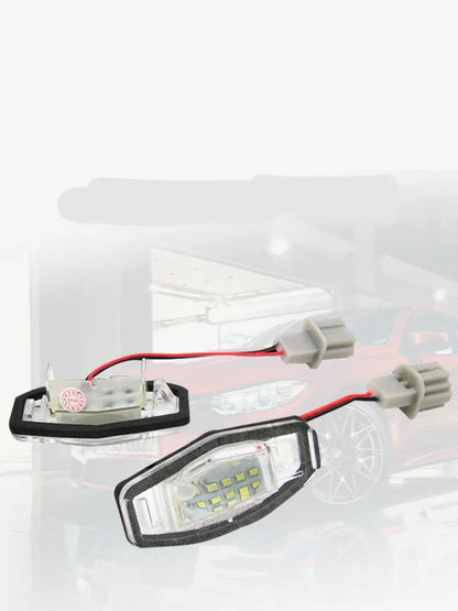 Honda Civic LED licence plate light showing white 6500-7000K illumination with plastic housing