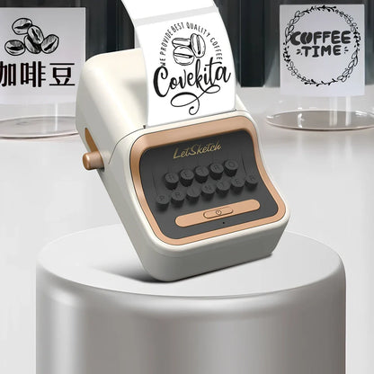 Portable thermal Bluetooth label printer measuring 135x92x60mm with included adhesive label rolls