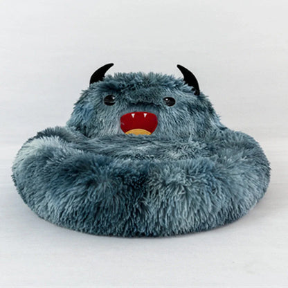Round plush cat bed with animal embroidery in dark blue, perfect for winter warmth