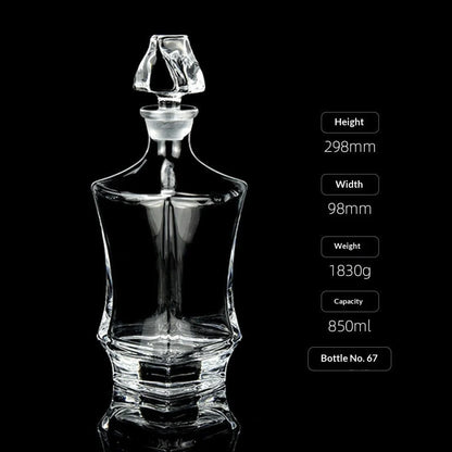 Hand-cut Bohemian crystal whiskey decanter with retro design and tapered pouring neck on wooden bar