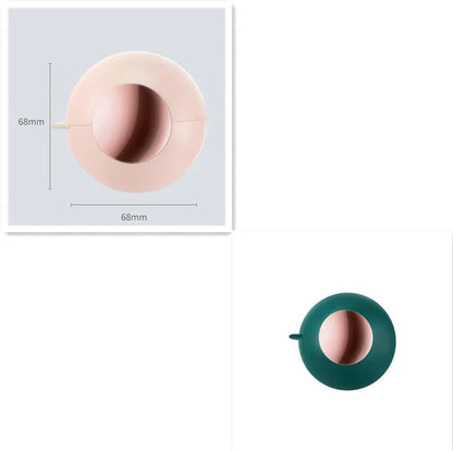 Green Gold reusable gel lint roller ball for removing pet hair from fabrics.