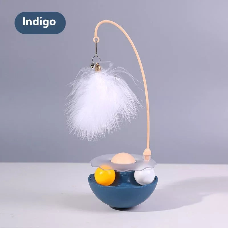 Interactive cat toy with catnip, feather wand, and spinning balls in white, indigo, fluorescent yellow, and pink