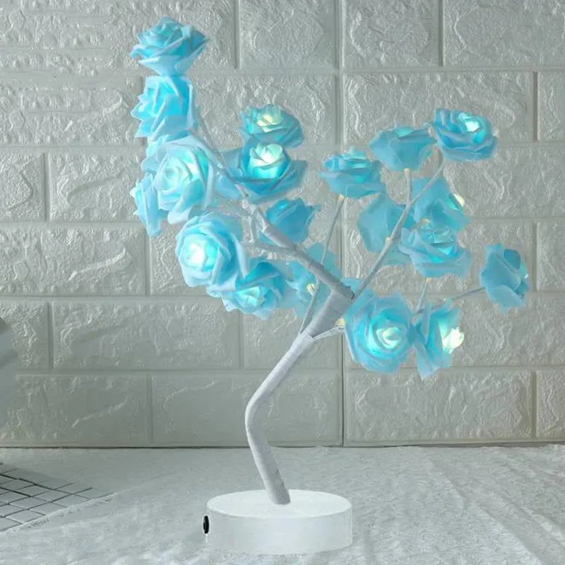 White and red rose flower LED lamp on a bonsai tree stand with warm white lights.
