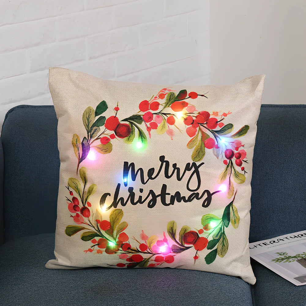 45cm square Christmas cushion with linen cover and battery-operated lighting showing festive design
