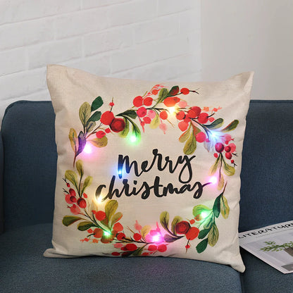 45cm square Christmas cushion with linen cover and battery-operated lighting showing festive design