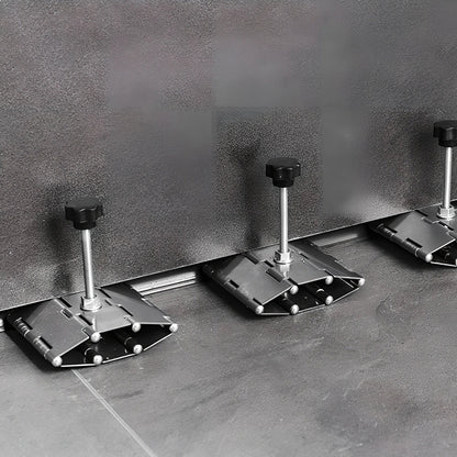 Metal tile levelling tool with hinge mechanism for height adjustment during installation