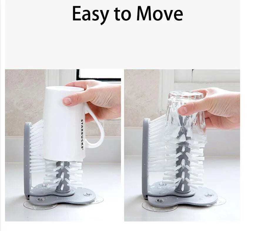 Grey rotating double-head cup brush with suction cups for wall mounting.