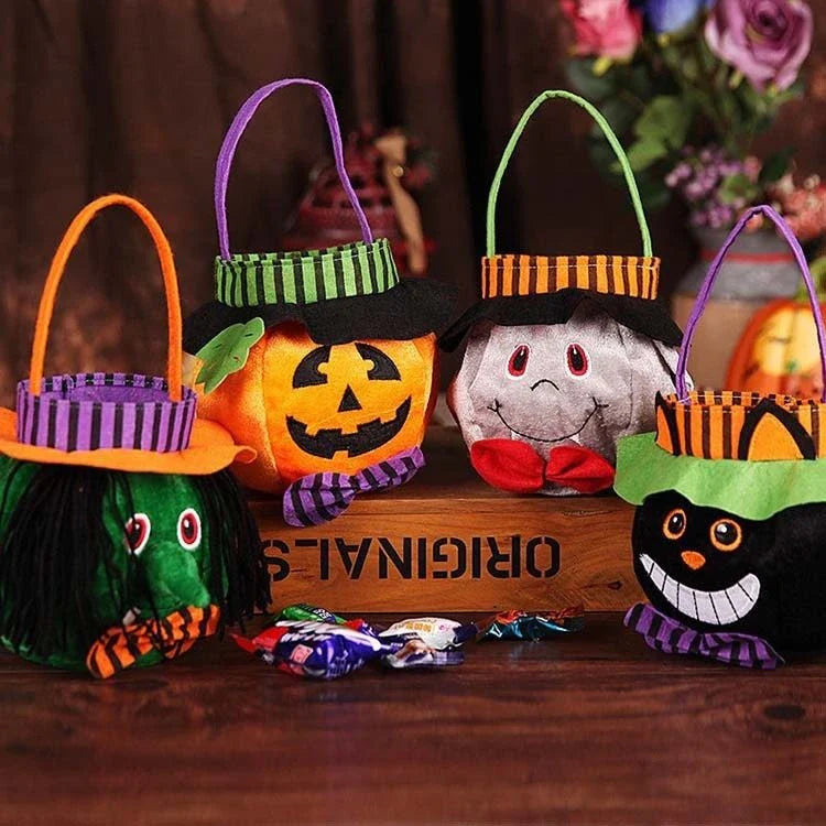 Festive Halloween candy bags with pumpkin and witch designs, great for trick-or-treating or handing out sweets