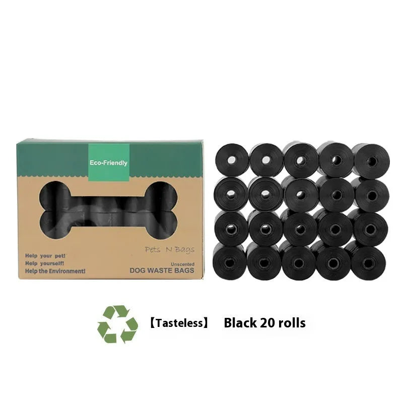 Roll of EPI green degradable pet waste bags next to a transparent dispenser on a grass background.
