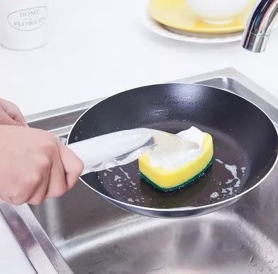 Non-stick kitchen oil pot brush with yellow head and transparent handle, featuring a scraper edge