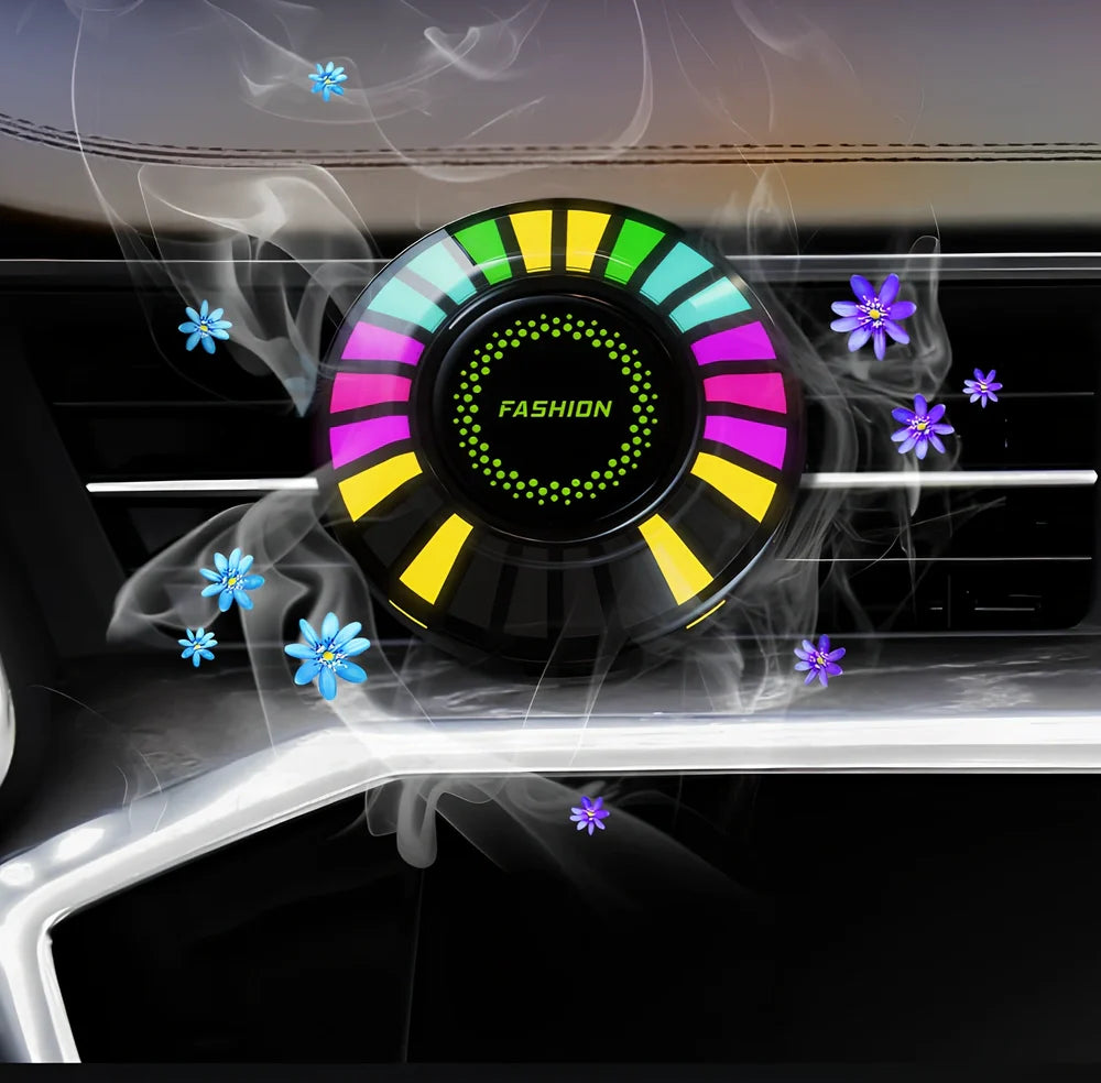 Car aromatherapy RGB light with 24 LEDs showing colour-changing patterns on vehicle air vent