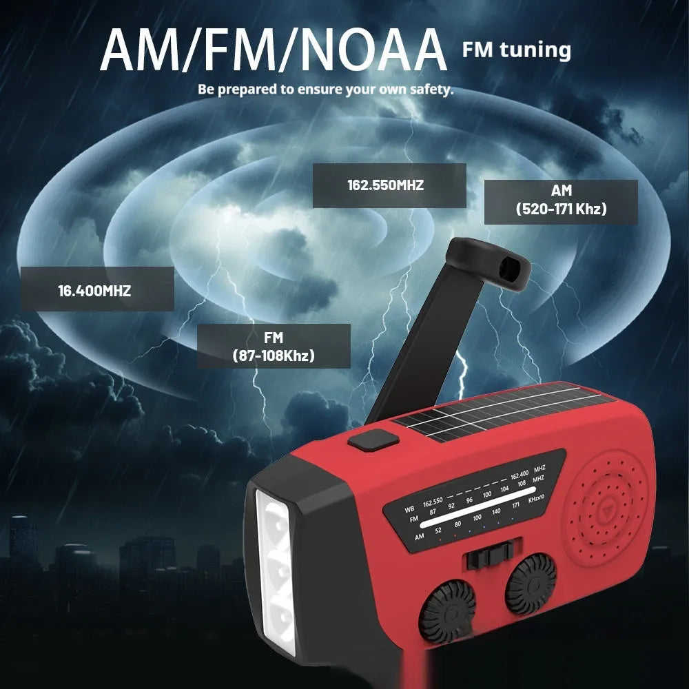 Red rechargeable hand radio with emergency torch, showing compact design with speaker grill and wrist strap attachment
