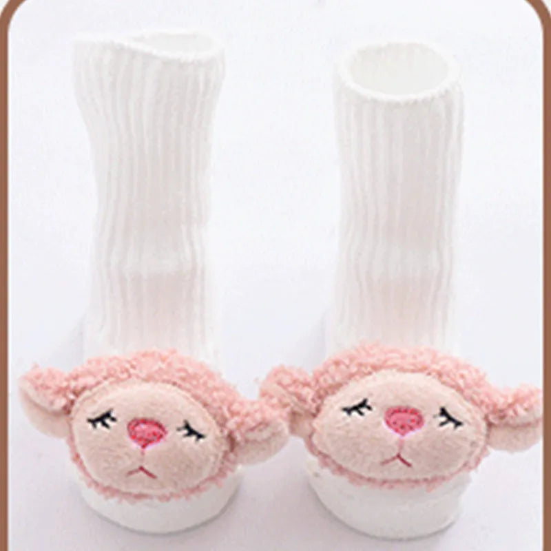 Cotton baby floor socks in assorted colours and patterns including bows, stars, and animal designs.