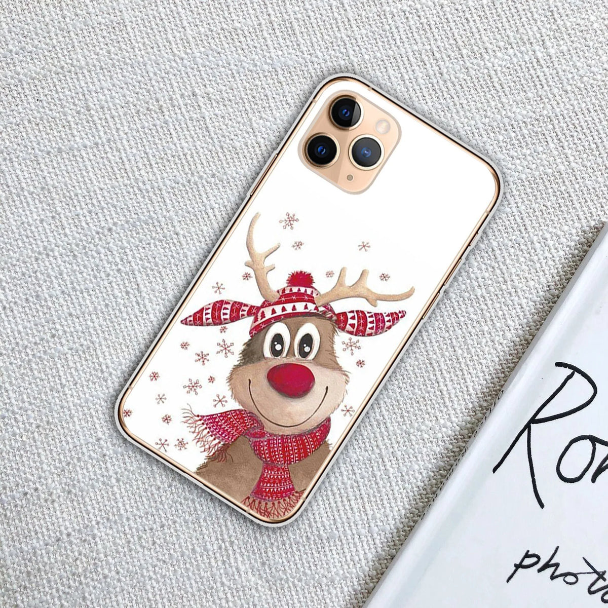 Christmas transparent phone case with festive design for iPhone models, available in eight styles.