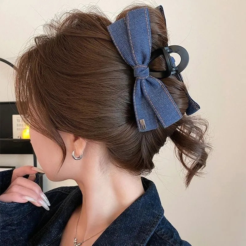 Handmade fabric bow hair grip with triangle grip design and plastic hairpin