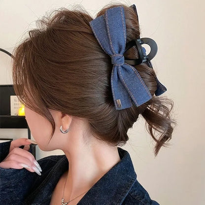 Handmade fabric bow hair grip with triangle grip design and plastic hairpin