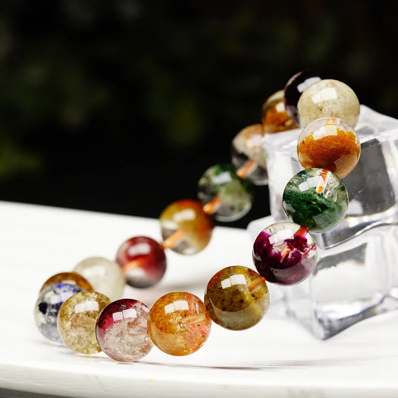Colourful ghost cornucopia design bracelet made with 10mm crystal beads in a retro ethnic ball bracelet style.