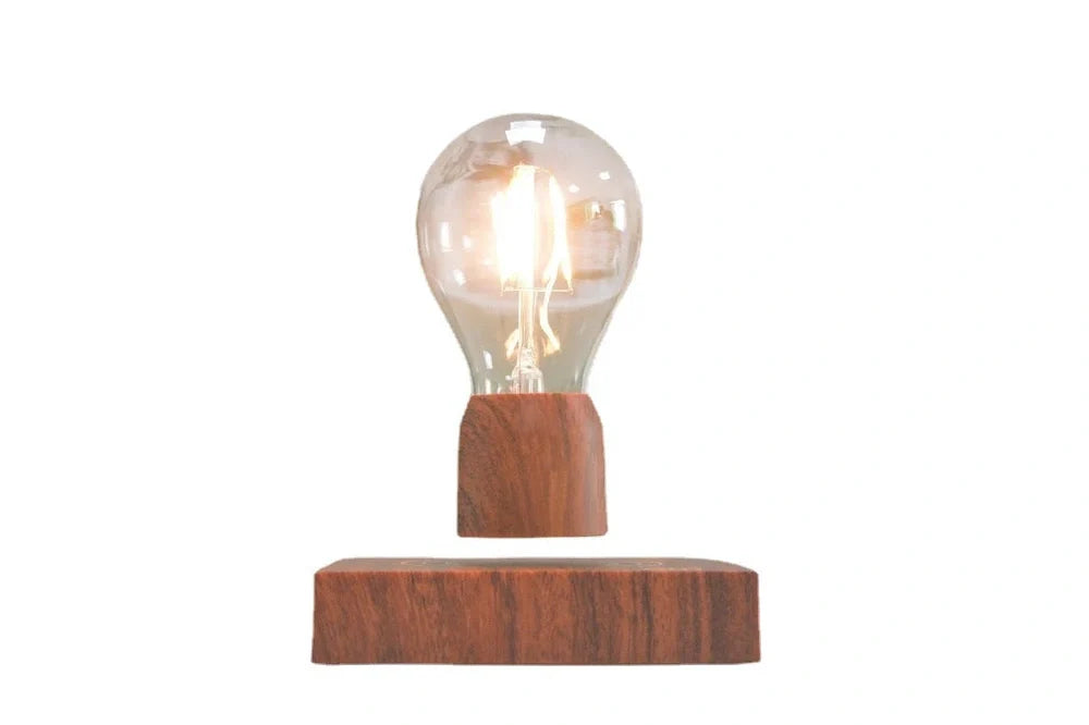 Magnetic levitation bulb floating above imitation wood base with international plug options