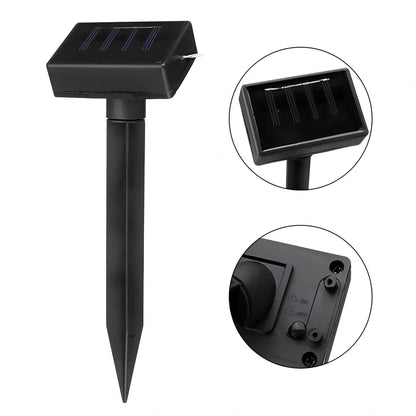 Pink flamingo-shaped solar garden light measuring 52.5cm tall with solar panel top